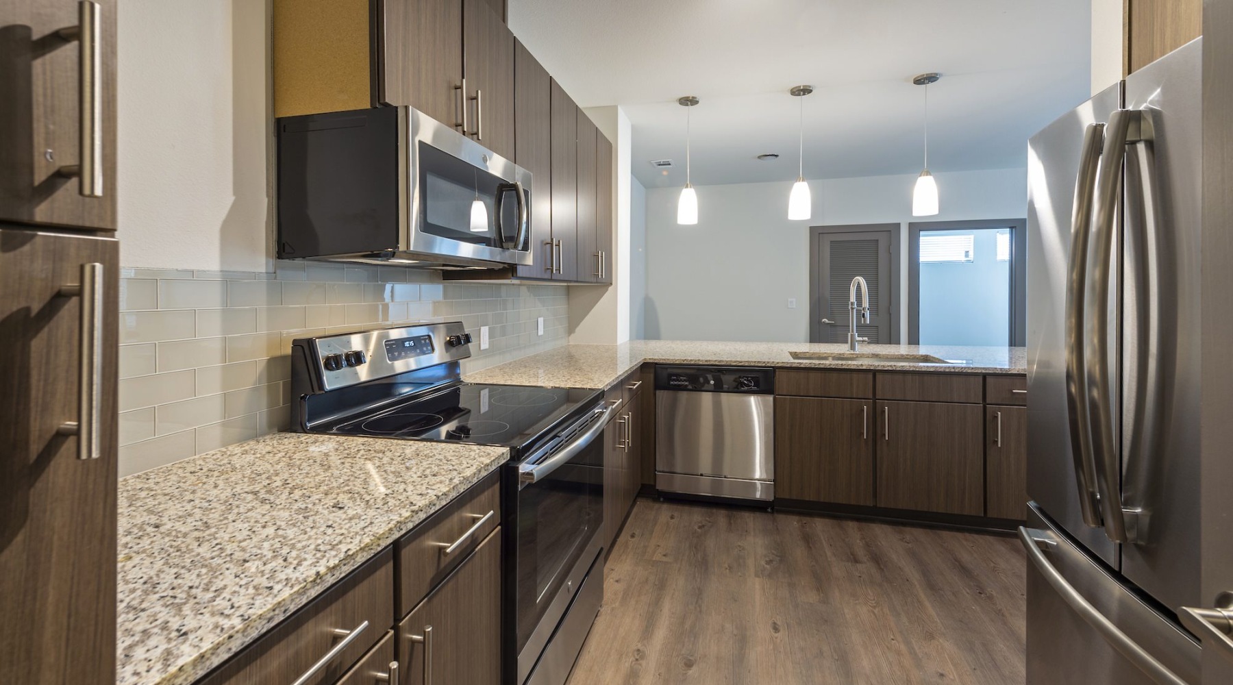 a kitchen with stainless steel appliances