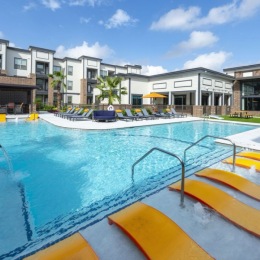 pool with lounge chairs