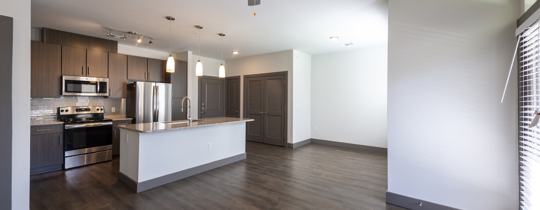 a kitchen with a wood floor